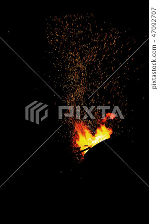 The flame sparks from a forge The flame sparks from a forge 47092707