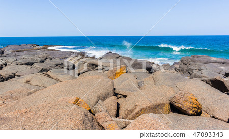Beach Large Boulders Blue Ocean Waters  Coastline 47093343