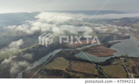 Aerial shot of Fiume Nera landscape near Terni on a partially cloudy day. Umbria, Italy Aerial shot of Fiume Nera landscape near Terni on a partially cloudy day. Umbria, Italy 47094211