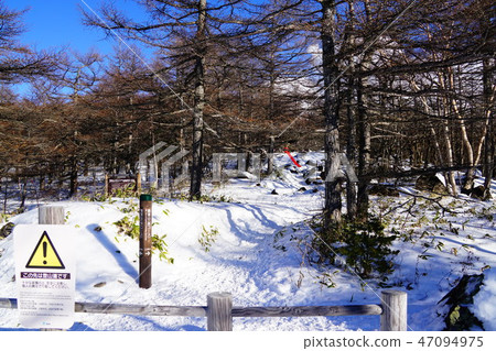 Snowy black spot mountain Snowy black spot mountain 47094975