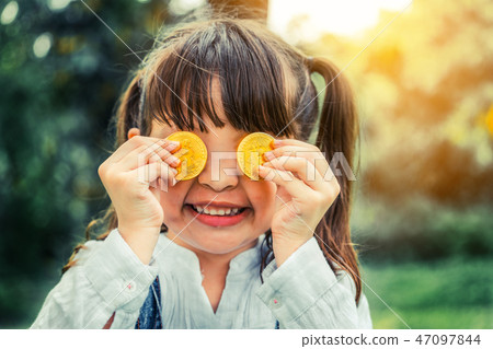 Little girl kid holding bitcoin digital money. Little girl kid holding bitcoin digital money. 47097844