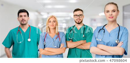 Doctor working in hospital with other doctors. Doctor working in hospital with other doctors. 47098604