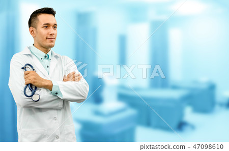 Male doctor standing in the hospital office. Male doctor standing in the hospital office. 47098610
