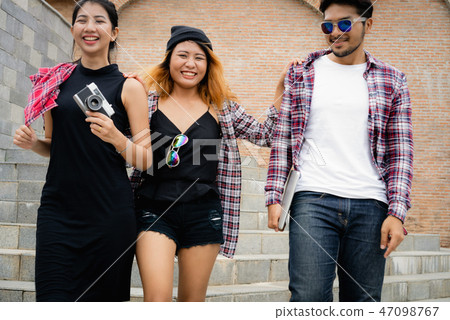 Group of university students walking in university 47098767