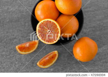 close up of fresh juicy blood oranges close up of fresh juicy blood oranges 47098994