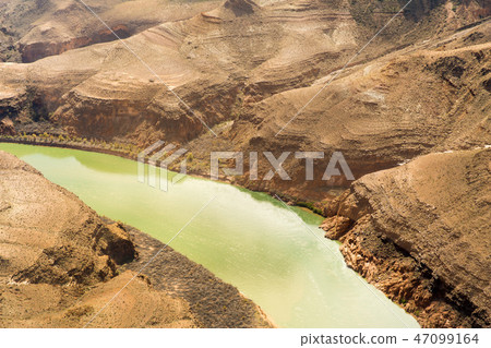 view of grand canyon cliffs and colorado river 47099164