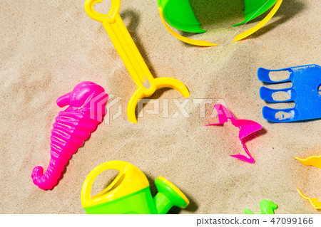 close up of sand toys kit on summer beach close up of sand toys kit on summer beach 47099166