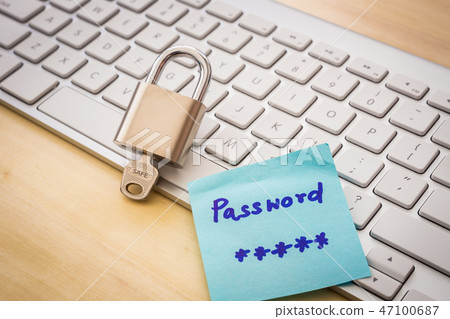 Padlock with SAFE word on key, keyboard background Padlock with SAFE word on key, keyboard background 47100687