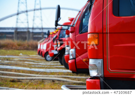 Fire trucks lined up in a row at the New Year's parade 47103687