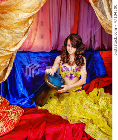 Oriental Beauty plays the tabla Oriental Beauty plays the tabla 47104500