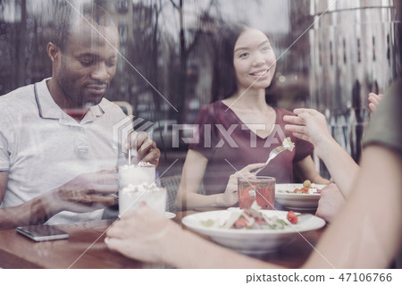 Beautiful female person eating salad Beautiful female person eating salad 47106766