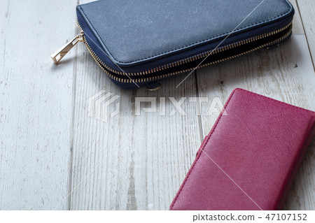 Navy wallet and smartphone 47107152