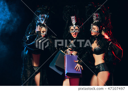 young beautiful dancers posing on studio background young beautiful dancers posing on studio background 47107497