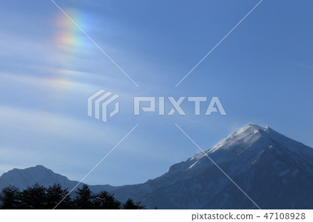 Vertical rainbow and northern alps 47108928