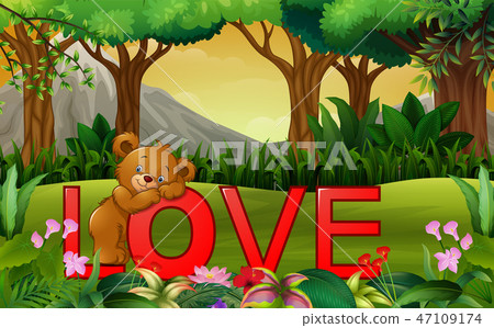 Cute funny bear on the red word LOVE on the nature 47109174