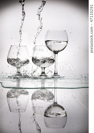 glasses and bottles for brandy and wine in the background glasses and bottles for brandy and wine in the background 47110291