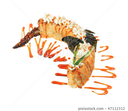 Sushi rolls in the shape of a dragon. Sushi rolls in the shape of a dragon. 47112312