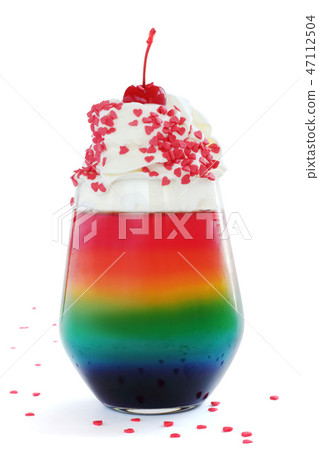 Rainbow Jello dessert with whipped cream 47112504