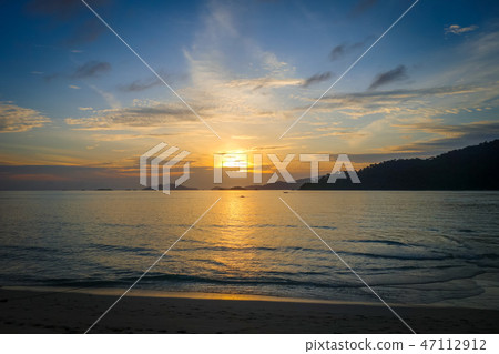 Tropical beach at sunset in Koh Lipe, Thailand Tropical beach at sunset in Koh Lipe, Thailand 47112912