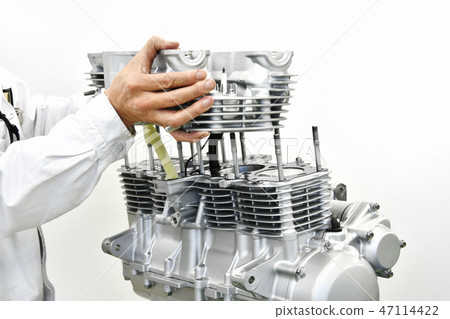 Maintenance of large motorcycle engine Maintenance of large motorcycle engine 47114422
