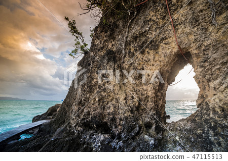 Inside of mainsail cave and view azure sea 47115513