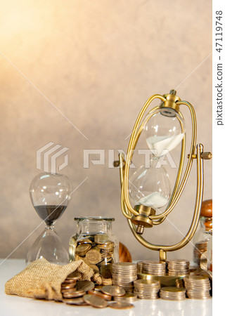 Saving money, Time Investment concept Saving money, Time Investment concept 47119748