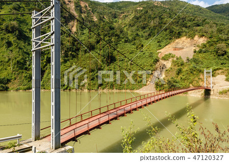 pedestrian bridge over the Nam na River, Vietnam pedestrian bridge over the Nam na River, Vietnam 47120327