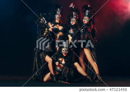 young beautiful dancers posing on studio background young beautiful dancers posing on studio background 47121450