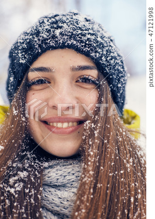 a Beautiful young woman in winter outside a Beautiful young woman in winter outside 47121998