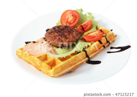 Belgian waffle with beefsteak and tomato slices 47123217