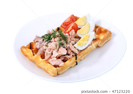 Belgian waffle with ham, boiled egg and tomato Belgian waffle with ham, boiled egg and tomato 47123220