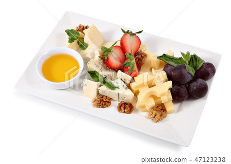 Cheese plate, isolated on white background Cheese plate, isolated on white background 47123238