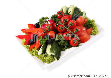 Assorted vegetables on plate isolated on white Assorted vegetables on plate isolated on white 47123245