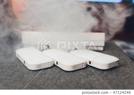 New technology of electronic cigarettes, system of heating of tobacco of IQOS. New technology of electronic cigarettes, system of heating of tobacco of IQOS. 47124246