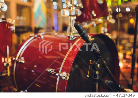 Drums conceptual image. Picture of drums and drumsticks lying on snare drum. Retro vintage instagram Drums conceptual image. Picture of drums and drumsticks lying on snare drum. Retro vintage instagram 47124349