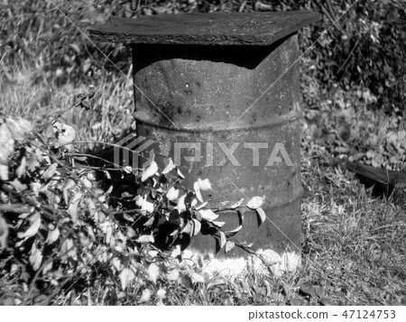 old barrel of trash in the fall in the garden old barrel of trash in the fall in the garden 47124753