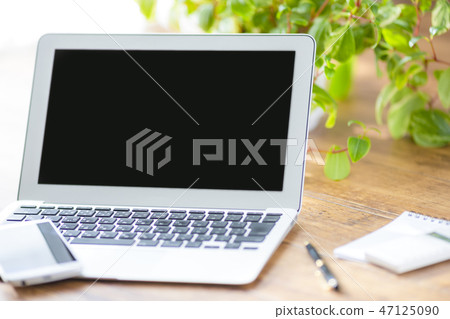 Laptop wood background Laptop wood background 47125090