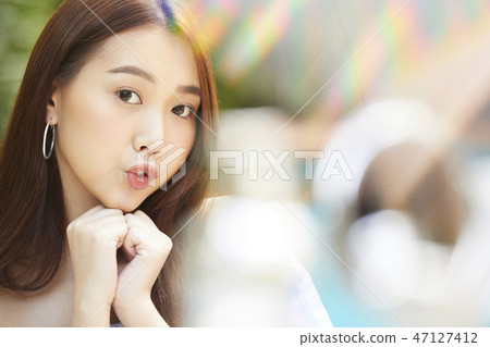 Woman portrait facial expression resort Woman portrait facial expression resort 47127412