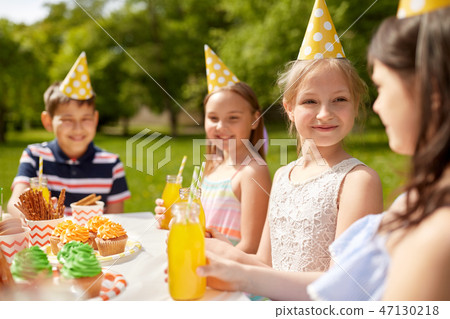 happy kids on birthday party at summer garden happy kids on birthday party at summer garden 47130218