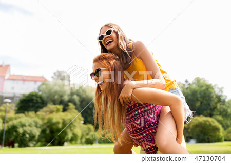 happy teenage girls having fun at summer park happy teenage girls having fun at summer park 47130704