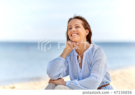 happy smiling woman on summer beach happy smiling woman on summer beach 47130856