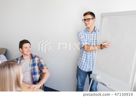 group of high school students with flip chart group of high school students with flip chart 47130919