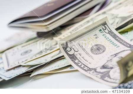 Money and passport for travel. US Dollar currency Money and passport for travel. US Dollar currency 47134109