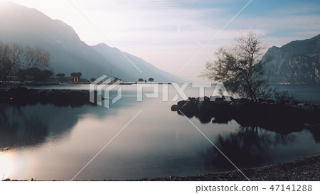 Lake Garda northern shore and surrounding mountains, Italy Lake Garda northern shore and surrounding mountains, Italy 47141288