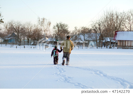 Happy boy grandpa have winter fun Happy boy grandpa have winter fun 47142270