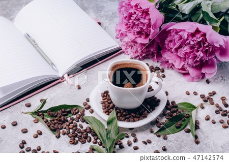 Beautiful background with coffee cup with peonies 47142574
