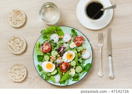 Clean eating. Fresh salad from vegetables. 47142726