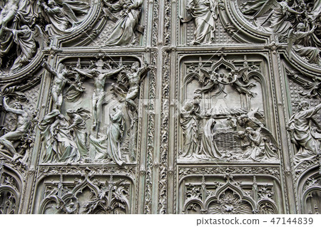 Detail bronze reliefs at Milan's Cathedral door 47144839