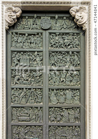 Bronze door of Milan's cathedral Duomo di Milano 47144841