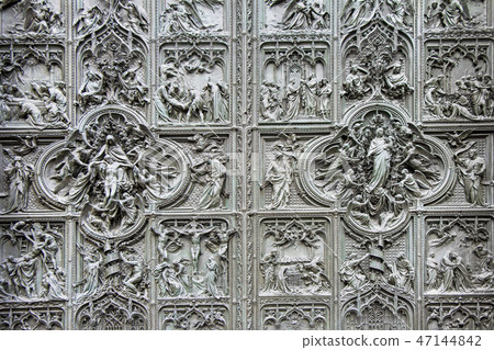 Detail bronze reliefs at Milan's Cathedral door 47144842